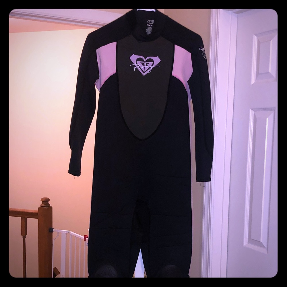 Roxy wetsuit size 12/40 black with pink accents